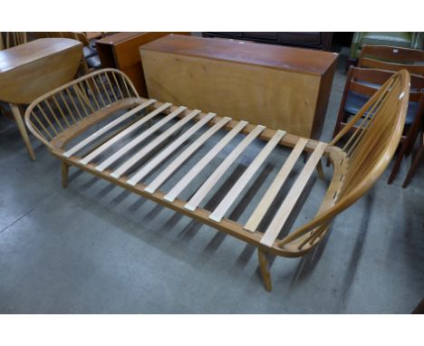 An Ercol Blonde beech single day bed 
