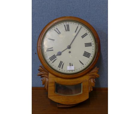 A Victorian walnut wall clock 