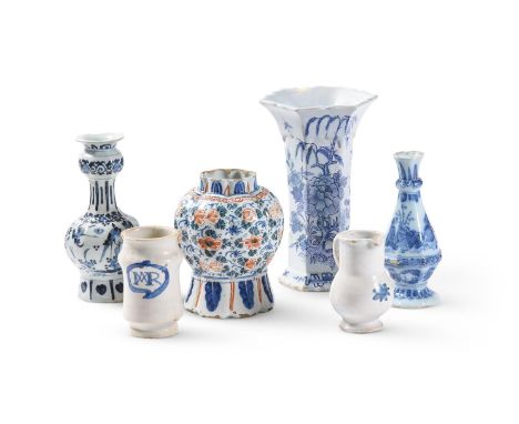 A SELECTION OF TIN-GLAZED EARTHENWARE 18TH AND 19TH CENTURIES  Including a Dutch Delft garlic necked vase, 19cm high, three o