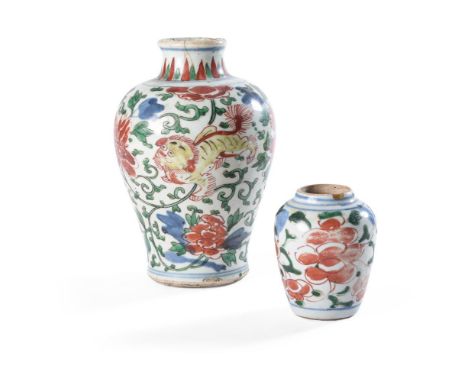 A FAMILLE VERTE VASE CHINESE, EARLY KANGXI  painted with Buddhist lions  18cm highTogether withanother small vase  painted wi