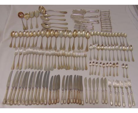 A quantity of continental white metal flatware to include twelve table knives, twelve dessert knives, eleven tablespoons, eig