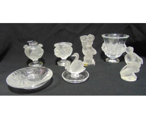 A quantity of Lalique glass to include vases, figurines and a table lighter (7)