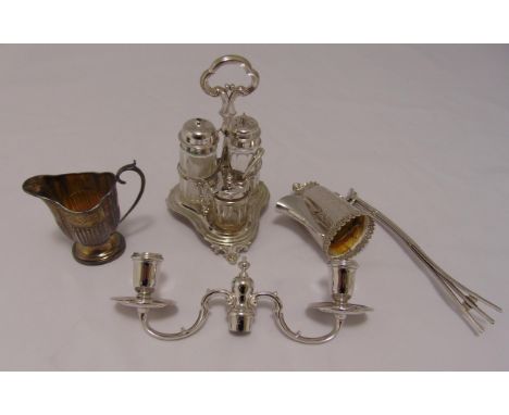 A hallmarked silver condiment set, the trefoil stand with pierced central scroll handle on leaf feet London 1842 with three w