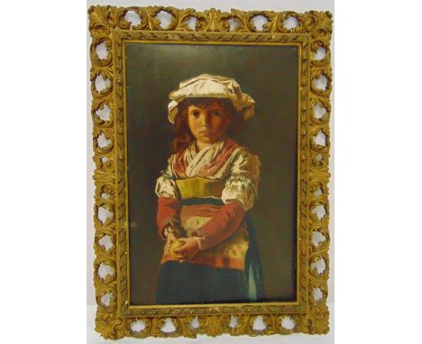 A continental framed oil on panel of a young girl wearing traditional dress and holding an apple, 46 x 30.5cm