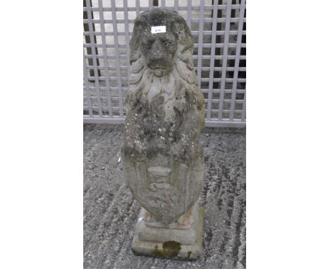 A reconstituted stone armorial garden lion statue, 81cm high