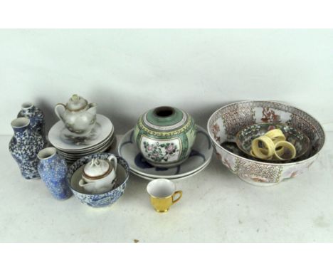 A collection of Asian ceramics, including: a Canton bowl, two blue and white carp dishes, a Japanese eggshell part tea servic