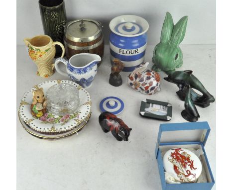 A collection of ceramics, including: a Cornish Ware Flour jar and cover, a Wade Art Deco jug, an oak biscuit barrel and cover