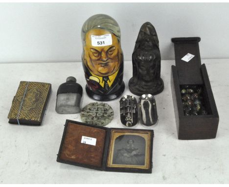 A selection of various collectables, to include a Daguerrot type Russian doll, a hip flask and other items