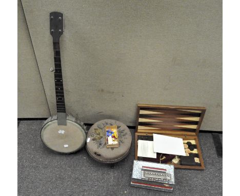  A late 19th century upholstered foot stool, of circular form, 30cm diameter; together with a backgammon set and other items