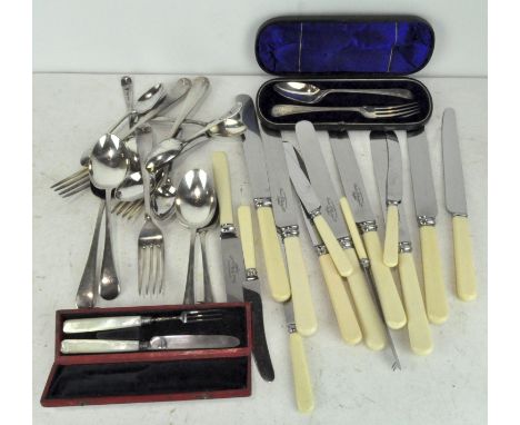 A Victorian cased silver set of Christening cutlery, comprising fork and spoon, each decorated with engraved motifs, hallmark