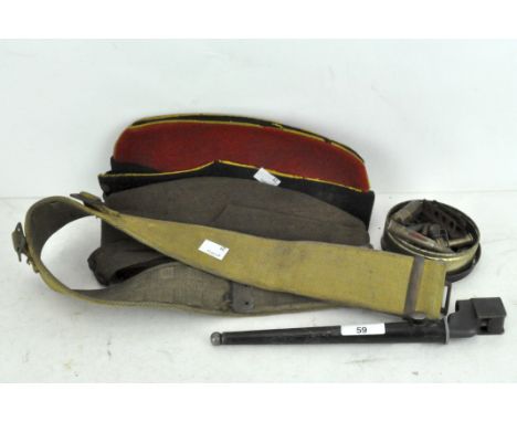 A collection of military items, to include a spike bayonet no 4 mk I S.286, trench art lighter, caps and more