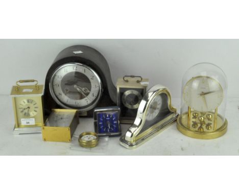 A selection of modern clocks, including Quartz carriage clocks, Smith's mantel clock and more
