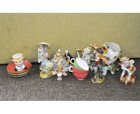 Three Royal Worcester cups and saucers; and a group of Continental porcelain figures