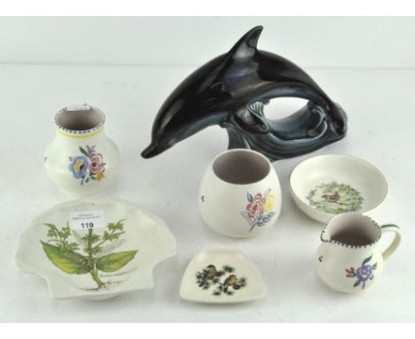 A selection of Poole pottery, including a large dolphin, Country Lane shell dish and more