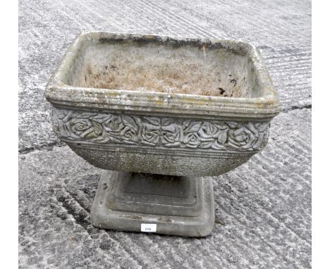 A garden square section footed planter, cast with roses, 52.5cm wide