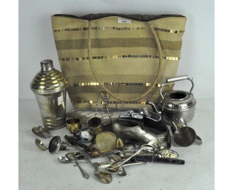 A group of silver plated wares, including an Art Deco cocktail shaker, assorted flatware, a Chester silver fork and a spoon t