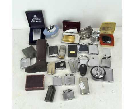 A large assortment of vintage lighters, including Ronson and a Wedgwood jasperware table lighter