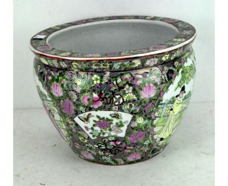 An Oriental glazed ceramic Famille Rose jardiniere, 19cm high