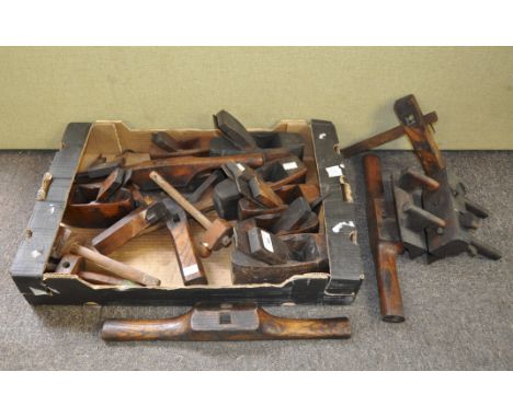 A collection of wood working planes and other tools including gauges