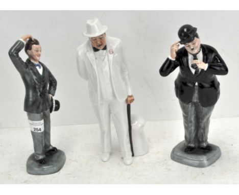 Three Royal Doulton ceramic figures, comprising; limited edition Oliver Hardy HN 2775, Sir Winston Churchill HN 3057 and Stan