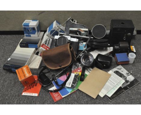 A collection of cameras and associated equipment, to include a Yashica TL electro X film camera, bakelite cased Kodak Brownie