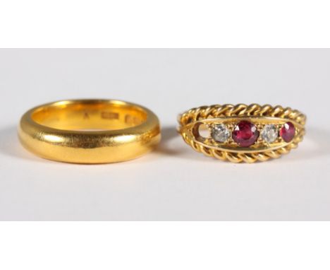 An 18ct gold, diamond and ruby dress ring (one stone missing), 4g approx, and a 22ct gold wedding band, 9g approx