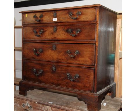 A George III mahogany chest, fitted four long graduated drawers with scroll cast gilt metal handles, on bracket supports, 32"