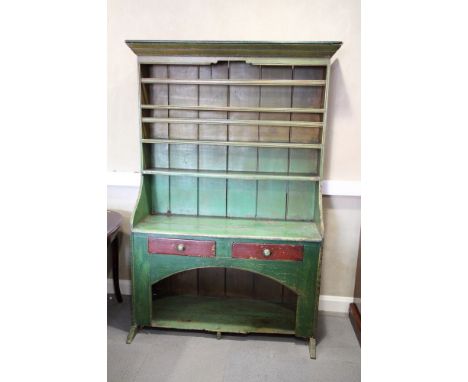 A 19th Century green painted pine dresser with boarded back, fitted three shelves over base, fitted three drawers and open sh