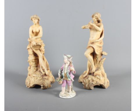 A pair of 19th Century porcelain figures, lady and gentleman, one playing a flute the other a tambourine, 10" high, together 