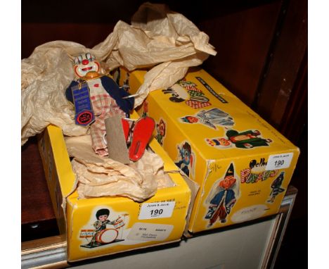 A Pelham puppet giant, a companion Goofy and a Chad Valley clockwork clown (hands missing), in original boxes