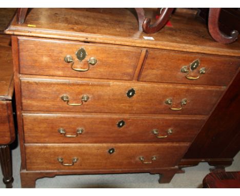 A 19th Century oak chest of two short and three long drawers, on bracket supports, 40" wide