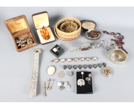 A small selection of costume jewellery, etc, a Chinese white metal scroll weight and a pair of silver plated candle snuffers