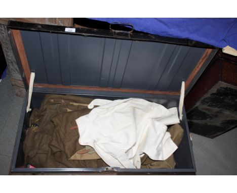 An RASC WWII uniform in tin trunk, complete with haversack, belt, etc, and a collection of related badges, shoulder flashes, 