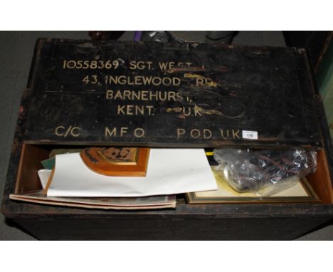 A wooden trunk and kit bag, belonging to Lieutenant West King's Own Scottish Borderers, containing two battle dress tops, a d