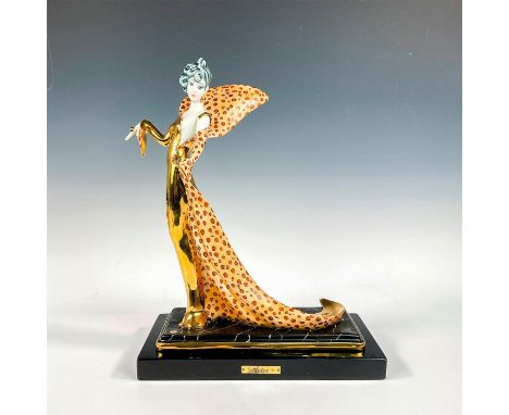 A beautifully painted porcelain Art Deco figure designed by Mario Pegoraro. Depicts a lender woman in an elegant gold and leo