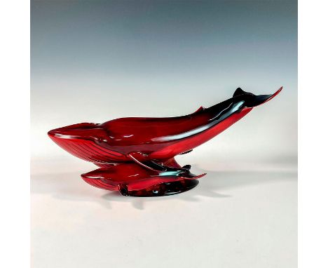 Rich red glaze with black highlights, modeled as a whale family swimming gracefully in the sea; unrecorded version of HN3468.