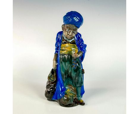 Extremely rare large titanium glaze figure, resulting in a blue, brown, green, and yellow coloration.Royal Doulton Titanium b