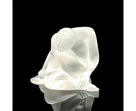 A beautiful frosted figure of a seated nude woman. Lalique France etched on the base. This item has its original box: 5.25"L 