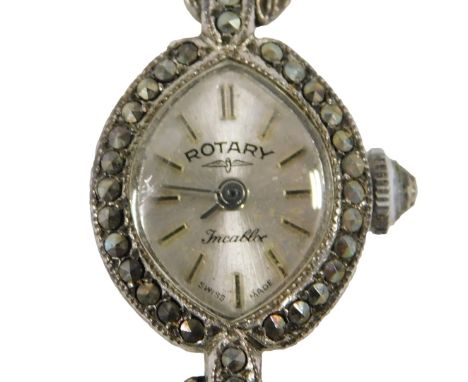 A Rotary silver and marcasite lady's wristwatch, the oval shaped dial with marcasite set border, 2cm high, 20cm long, in H Sa