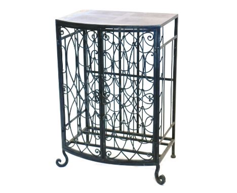 A wrought iron bow fronted wine cabinet, with two doors with pierced scrolling decoration, on scrolling feet, 83cm high, 56cm