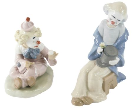 Two Nao porcelain clown figures, one with ball, the other a top hat, 18cm high, etc. 