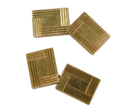 A pair of yellow metal rectangular engine turned cuff links, indistinctly marked, 6.4g.