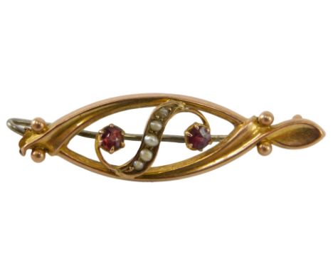 A seed pearl and ruby brooch, brooch of oval design, yellow metal, stamped 9ct, 1.3g all in. 