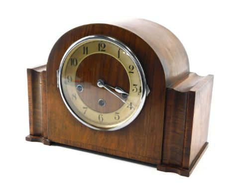 A walnut cased mantel clock, with Westminster chime, stamped foreign, 31cm wide. 
