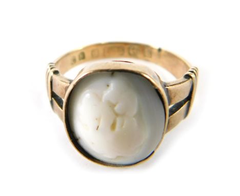 A 19thC cameo dress ring, mounted centrally with a cameo, bearing hallmarks, 9ct, adapted, ring size K, 2.7g all in. 