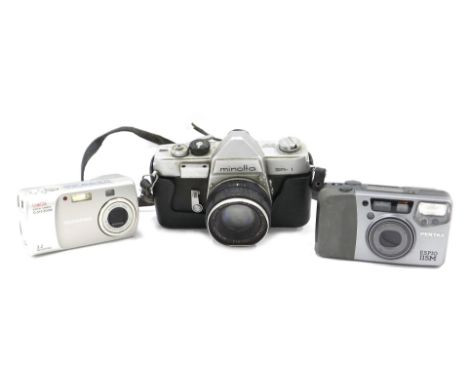 A Minolta SR1 camera (AF) and two other cameras. 