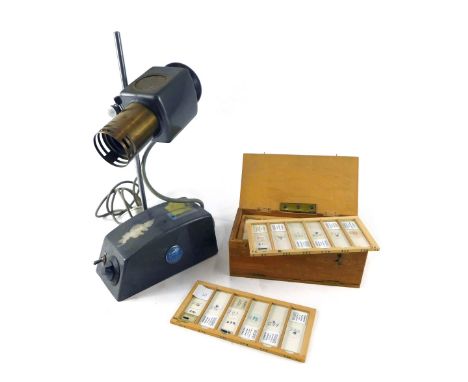 A C Baker of London microscope slide projector, and various slides.&nbsp;WARNING! This lot contains untested or unsafe electr