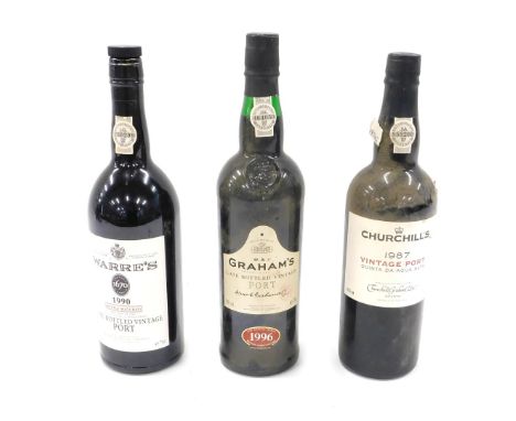 Three bottles of port, Warre's bottle matured 1990, Churchill's 1987 vintage, and Graham's 1996 late bottle vintage. 