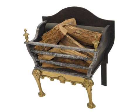 A cast iron and brass fire grate, on tapering feet, 55cm wide. 