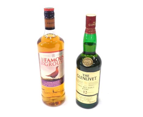 A bottle of Glenlivet single malt scotch whisky, aged twelve years, and a bottle of Famous Grouse whisky. (2)